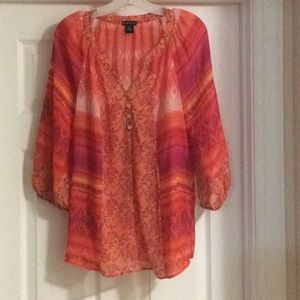 Burnt colored blouse perfect for office.